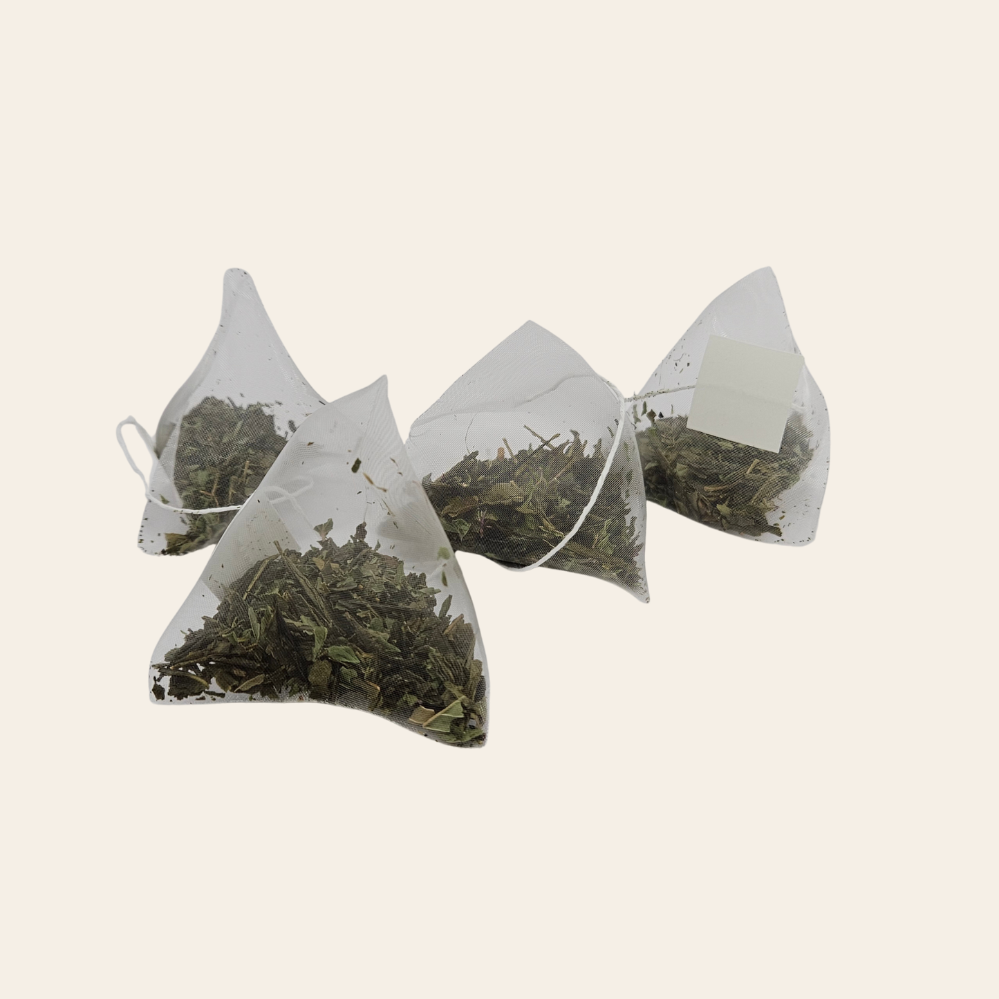 Infusettes, sachet mousseline de thé vert. La blibliothéière